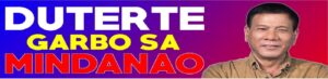 A 2016 campaign banner reading "DUTERTE — GARBO SA MINDANAO" (Mindanao's pride) beside a photo of Rodrigo Duterte.